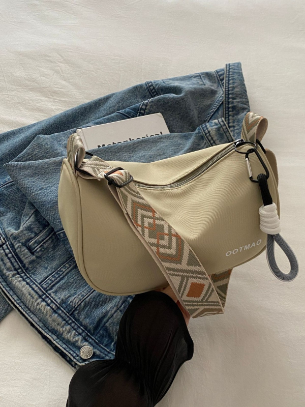 Dámska crossbody taška Dumpling - street trend, PU materiál, tvar vankúša, zipsové zapínanie, vrecko na telefón, polyesterová podšívka