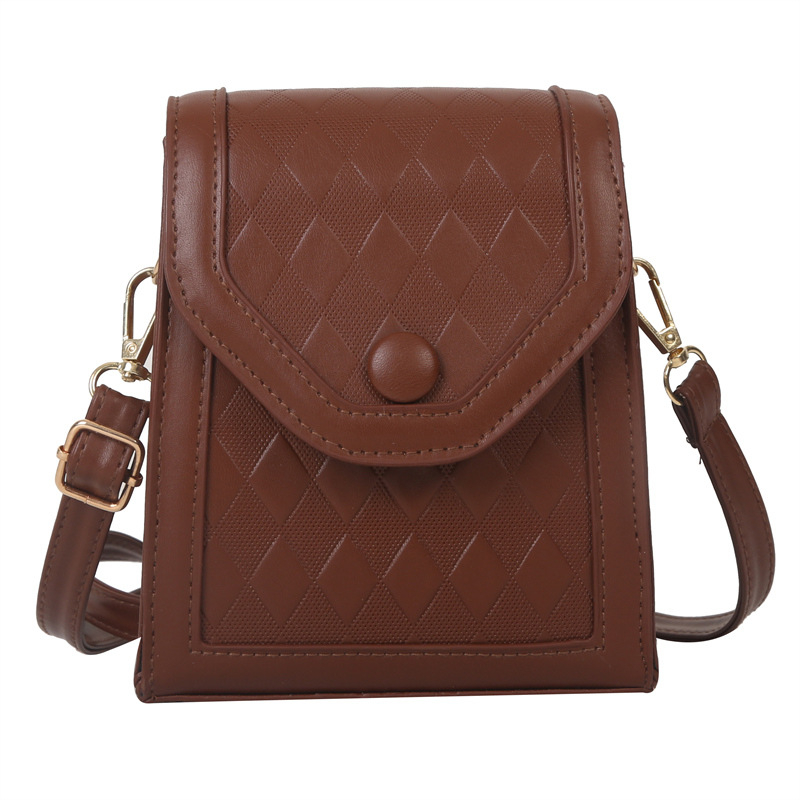 Keresztpántos válltáska | PU anyag | függőleges négyszögletes forma | zárás fedéllel | belső bélés: szintetikus bőr | tavasz 2024