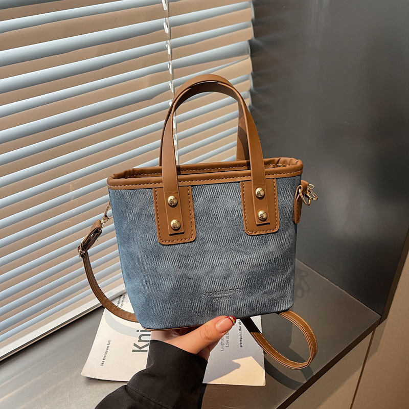 Bucket táska PU anyagból, street style, zip nyitás, laminált belső zseb, poliészter bélés, egy vállpánt, mindennapi használatra, őszi 2025