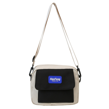 Nappali crossbody táska Oxford anyagból, hengeres forma, cipzáras nyitás, belső nylon bélés