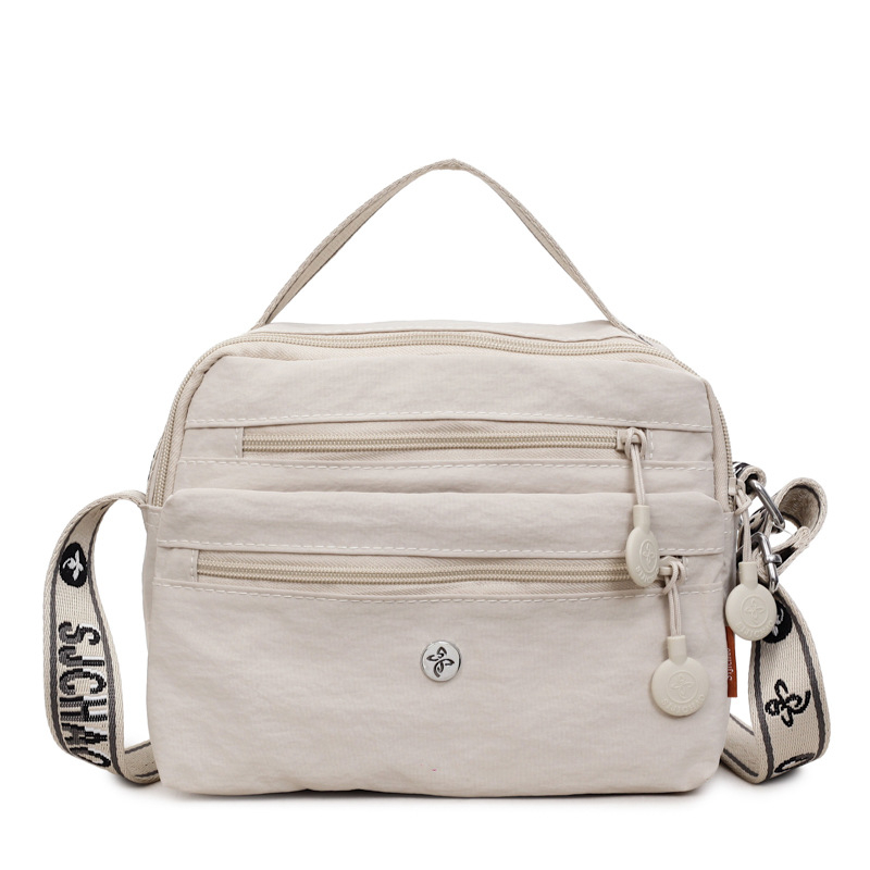 Nylonová crossbody taška so zipsom, horizontálny štvorcový tvar, priečinok na dokumenty, polyesterová podšívka, zimné vydanie 2025