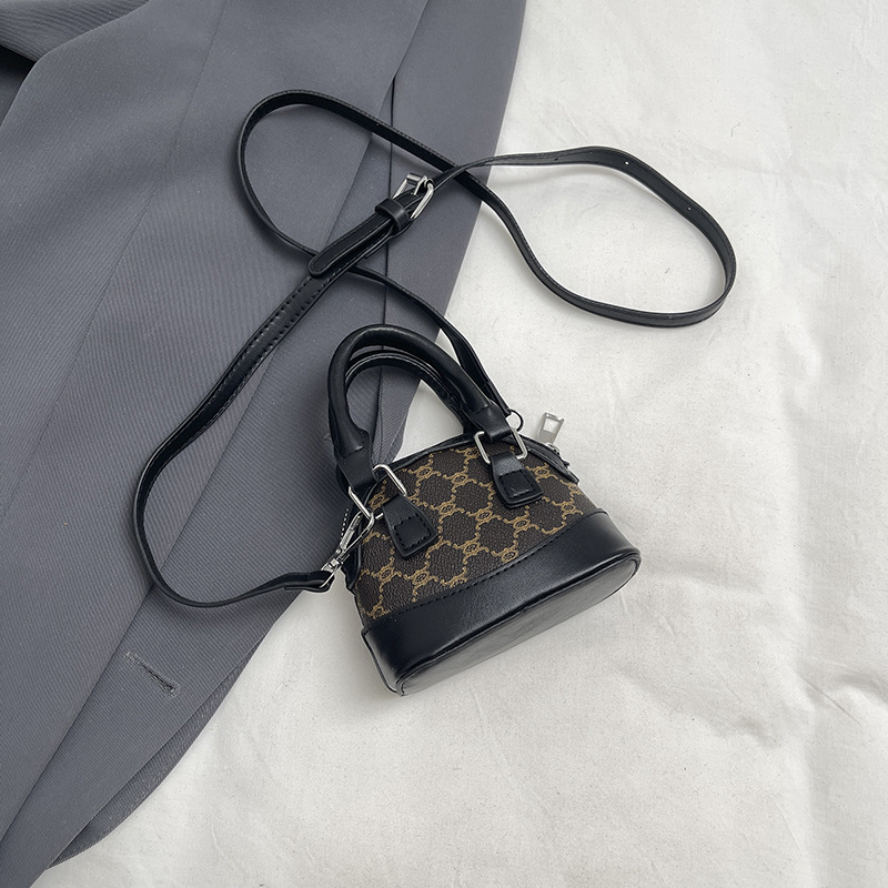 Taška v tvare mušle, s jedným ramenným popruhom – PU materiál, zips, podšívka z polyesteru, mestský štýl