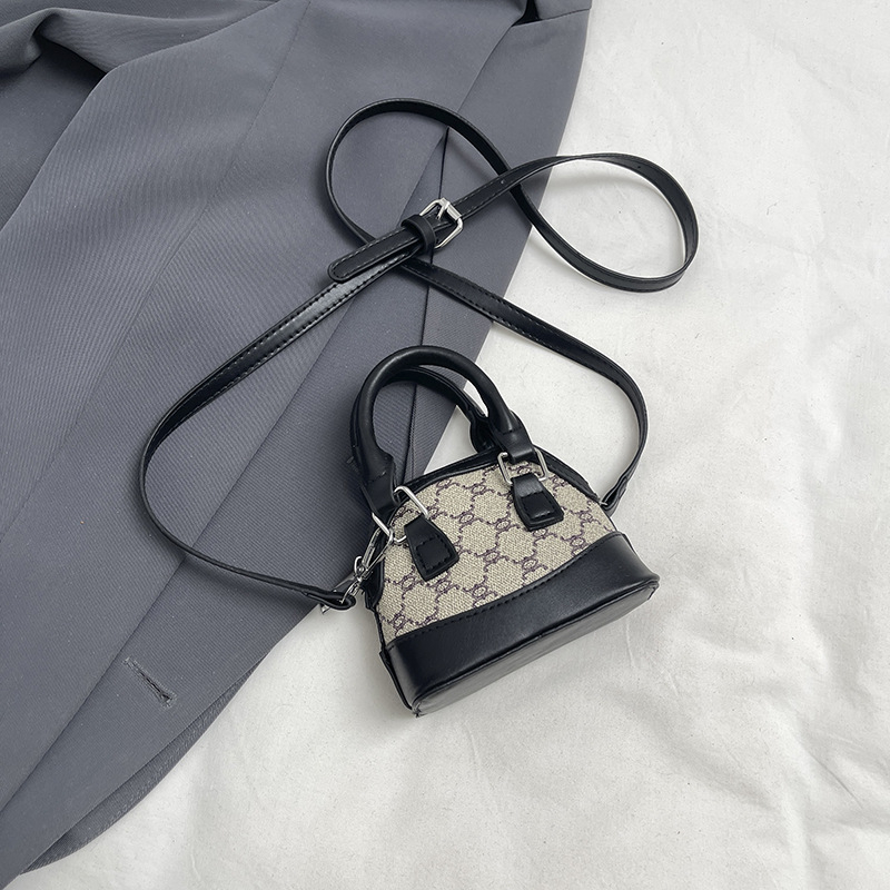 Taška v tvare mušle, s jedným ramenným popruhom – PU materiál, zips, podšívka z polyesteru, mestský štýl