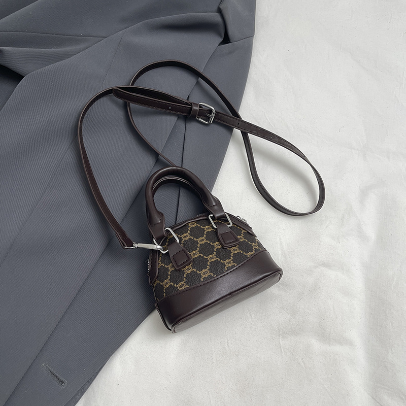 Taška v tvare mušle, s jedným ramenným popruhom – PU materiál, zips, podšívka z polyesteru, mestský štýl