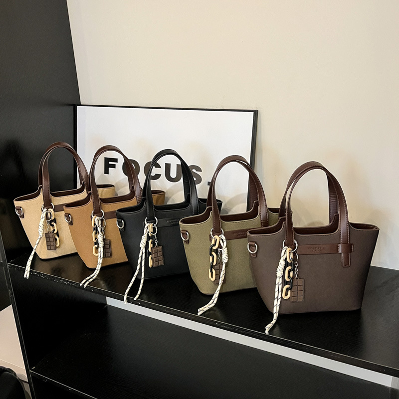 Crossbody bucket táska — PU bőr, városi minimalist stílus, cipzár, vízszintes négyzet alak, poliészter bélés