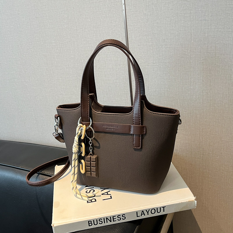 Crossbody bucket táska — PU bőr, városi minimalist stílus, cipzár, vízszintes négyzet alak, poliészter bélés