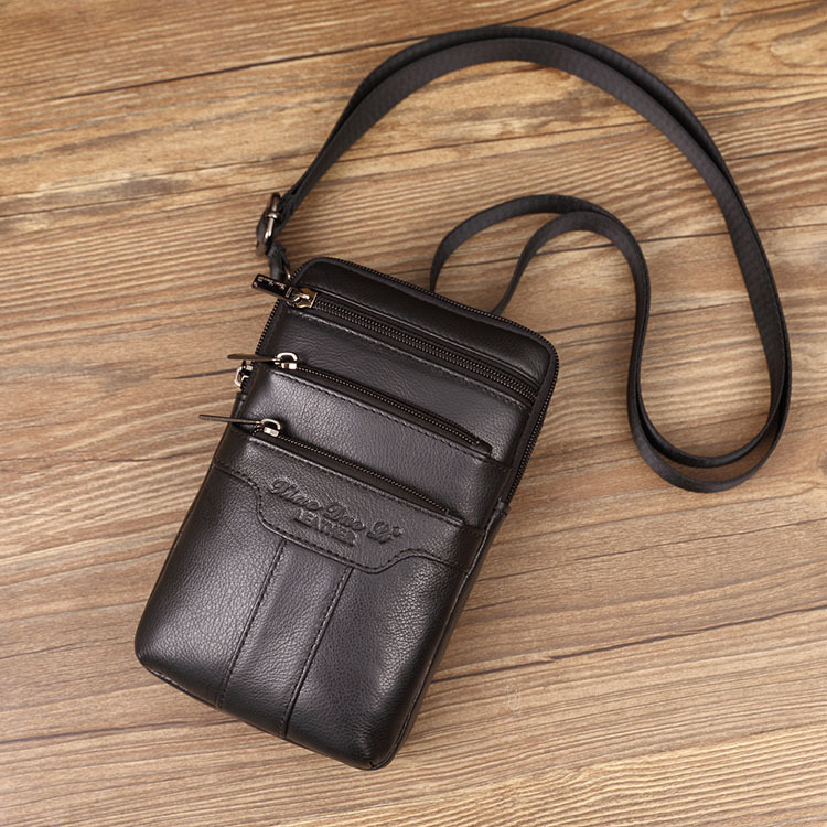 Material: Pie­le naturală; Geantă talie pentru bărbați din piele, mini, cu fermoar, formă verticală pătrată; buzunare interioare cu fermoar, pentru telefon și ID; căptușeală poliester; purtare pe curea sau pe umăr