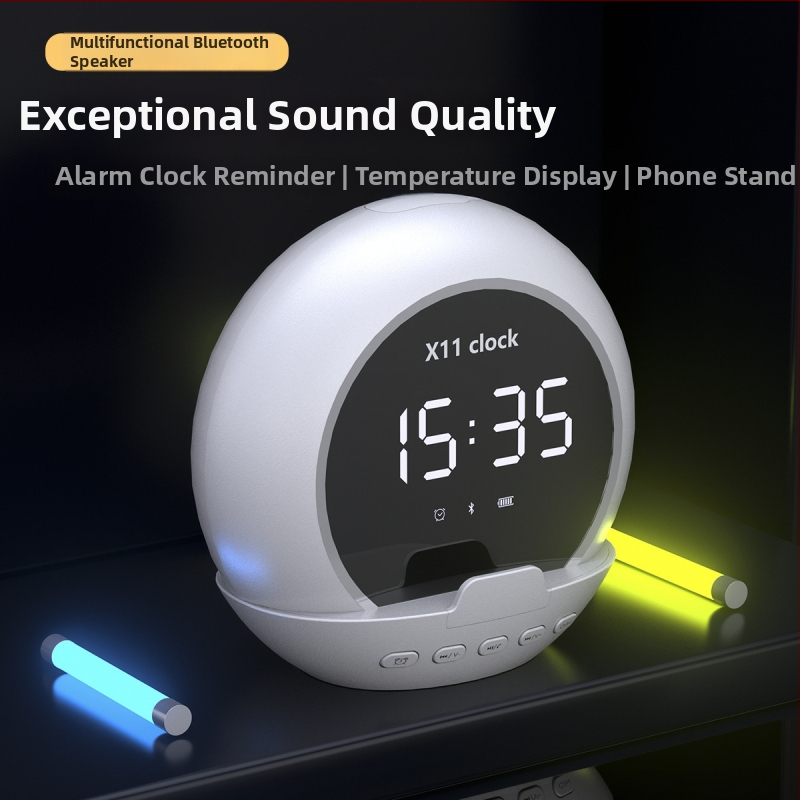 Vezeték nélküli Bluetooth hangfal ébresztővel, hőmérővel, digitális kijelzővel és telefon-tartóval; Bluetooth 5.3, 5W teljesítmény, 20 Hz–20 kHz frekvencia, SNR ≥85 dB, beépített 1000–1200 mAh akkumulátor