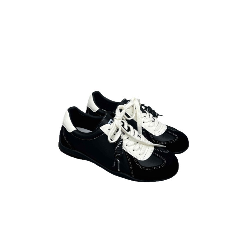 Ženske tenisice inspirirane njemačkim vojnim stilom, gornji dio od kože i tekstila, peta 3–5 cm, prednje vezanje, gumeni potplat