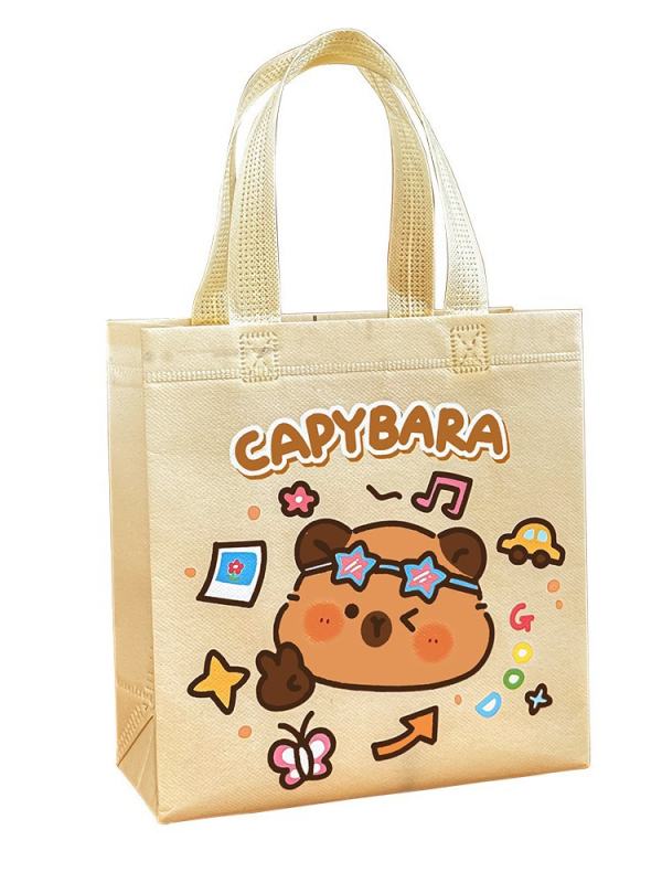 Kapibaras karikatūras somiņa pamatskolai — universāla, bez oderes, dzīvnieku raksts, materiāls: cits, izlaidums 2025. gada pavasarī