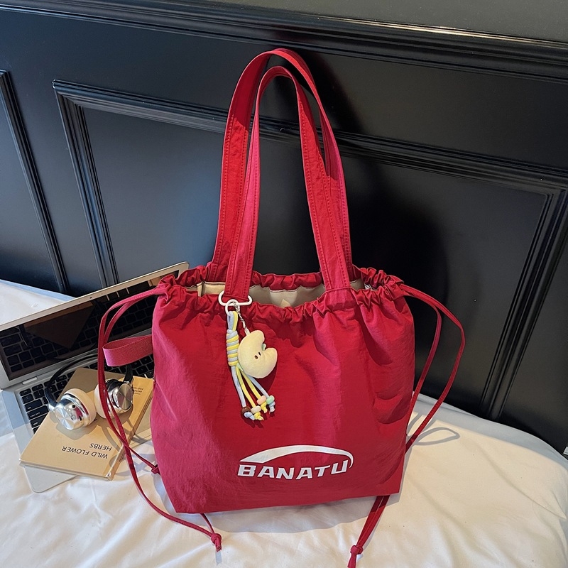 Ľahká nylonová tote taška so sťahovacím otvorom, vnútorná kapsa na telefón, Jeseň 2025