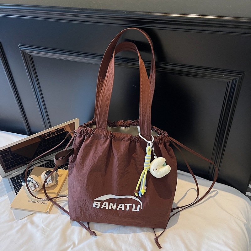 Ľahká nylonová tote taška so sťahovacím otvorom, vnútorná kapsa na telefón, Jeseň 2025