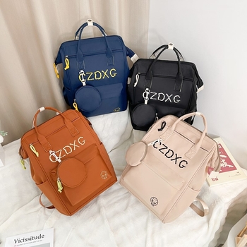 Twill anyagú hátizsák betű mintával, 20–35L kapacitás, 15 hüvelykes laptop rekesz, görbült vállpántok