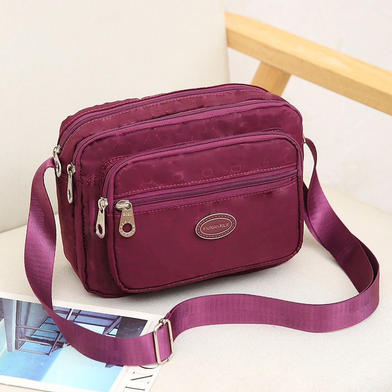 Geantă crossbody din nylon pentru femei – impermeabilă, siluetă pătrată orizontală, închidere cu fermoar, buzunar interior cu fermoar, căptușeală poliester-cotton