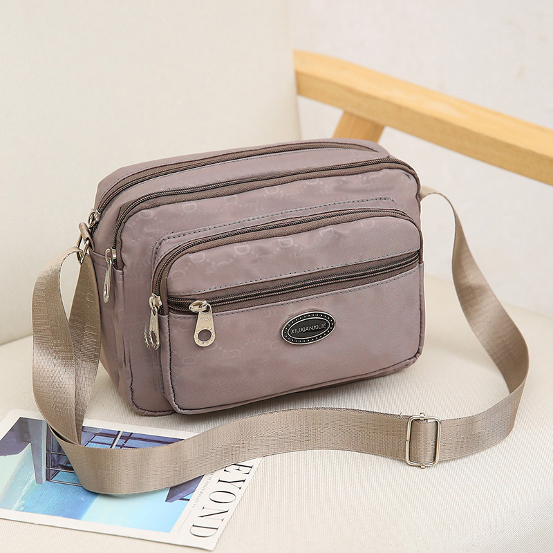 Geantă crossbody din nylon pentru femei – impermeabilă, siluetă pătrată orizontală, închidere cu fermoar, buzunar interior cu fermoar, căptușeală poliester-cotton