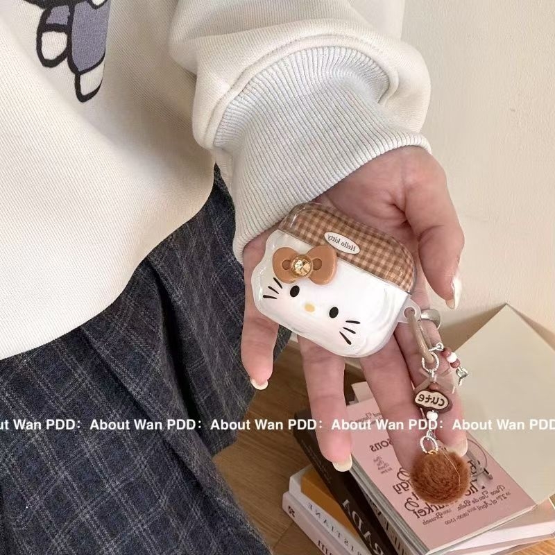 Smeđi KT mačji uzorak zaštitni kućište za AirPods 4 i AirPods Pro 3 s graviranim prikazom