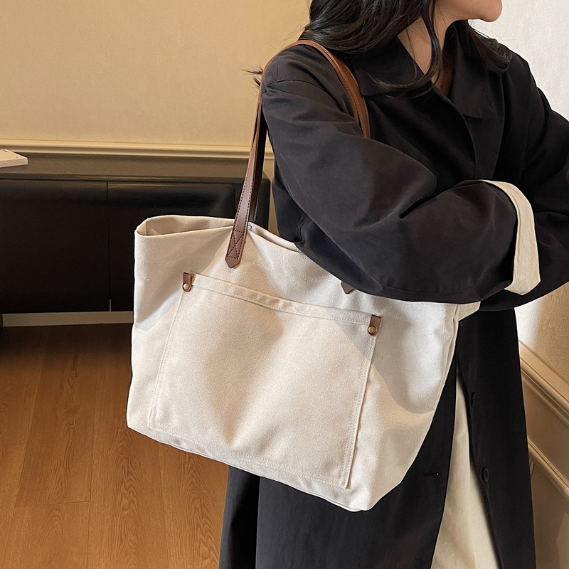 Geantă Tote din canvas pentru femei — fără căptușeală, formă orizontală pătrată, închidere cu snap, buzunar pentru telefon și buzunar interior