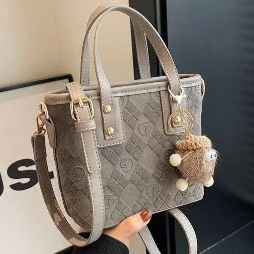 Női bucket táska kézi fogantyúval, váll- vagy crossbody pánttal, retro stílusú, magas minőségű dizájn mindennapi használatra