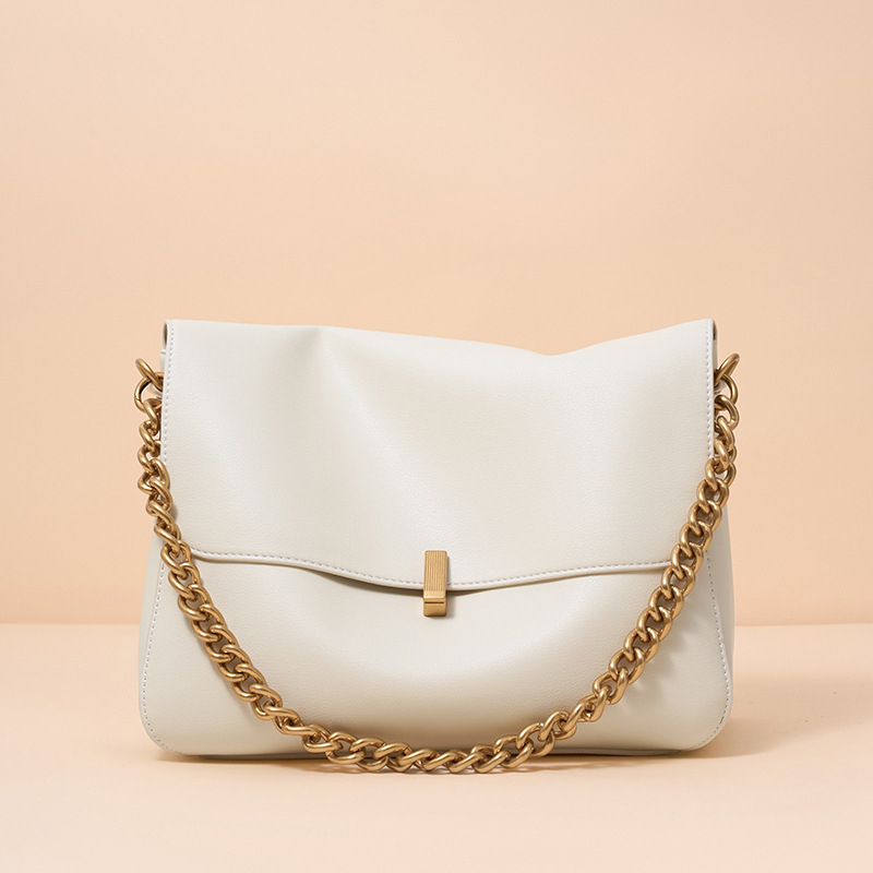 Velika ženska torba preko ramena od kravljeg kože — gradski minimalistički stil, horizontalni kvadrati oblik, zaključavanje s ključem, unutarnji džep sa zipom, džep za telefon i dokumente