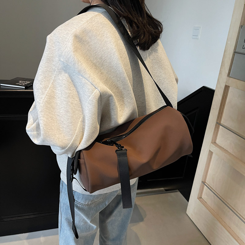 Crossbody torba cilindričnog oblika od Oxford platna, zatvarač, unutarnja džep sa zatvaračem