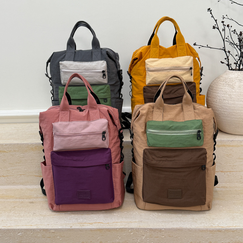 Unisex lagani ruksak s dizajnom color-block za svakodnevnu upotrebu i putovanja, kapacitet 20–35 L, kompatibilan s 13-inčnim prijenosnikom, model 2025