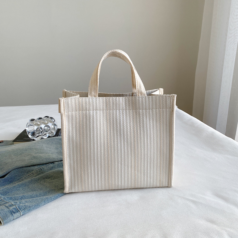 Ženska torba u street stilu, torba od platna, mala kvadratna torba, horizontalni kvadratni oblik, magnetsko kopčanje