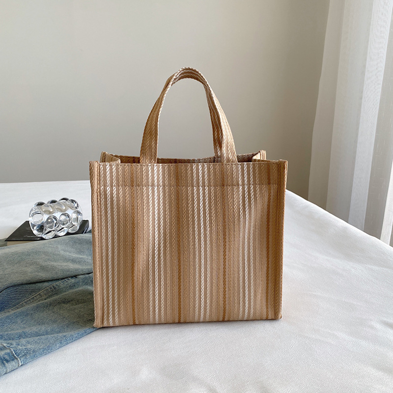 Ženska torba u street stilu, torba od platna, mala kvadratna torba, horizontalni kvadratni oblik, magnetsko kopčanje