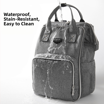 Mamos kuprinė – poliesteris, atspari vandeniui, sausas–drėgnas atskyrimas, maksimalus apkrova 15–20 kg, matmenys 42×27×8 cm