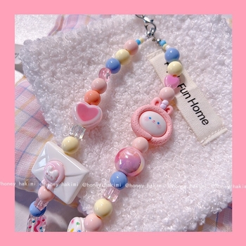 Ručno izrađeni koraljni lančić za telefon s roztomilim zeko u ružičastim nijansama; Materijal: PVC; Materijal užeta: PVC; Materijal kopče: plastična kopča; Stil: unisex; Pakiranje: pojedinačno pakiranje