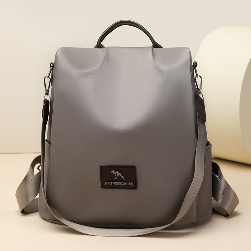 Nagy kapacitású hátizsák Oxford anyagból, városi egyszerű stílus, lopás elleni kialakítás, rejtett cipzáras zseb.