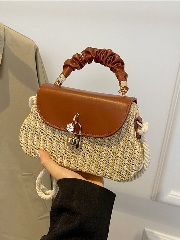 Torba od slame – kutijastog oblika | Materijal: Slama; Podstava: Poliester; Oblik: Ovalni; Način otvaranja: Brava; Vanjski tip torbe: Trodimenzionalna