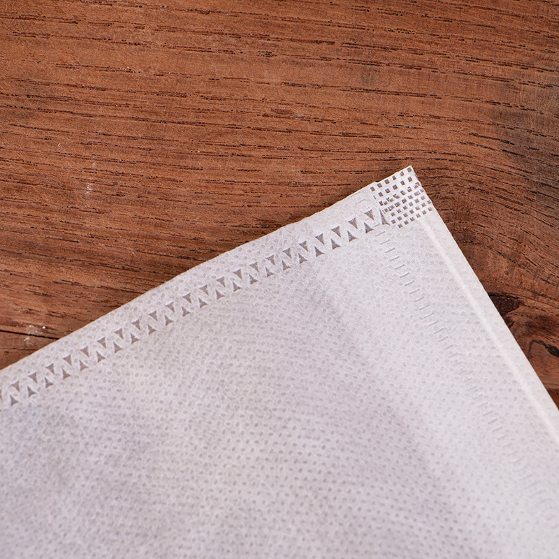 Vienreizējais tējas maisiņš ar auklu – neaudums filtrējošs maisiņš, piemērots tējai, garšvielām, ķīniešu medicīnas dekoktiem un kāju vannām