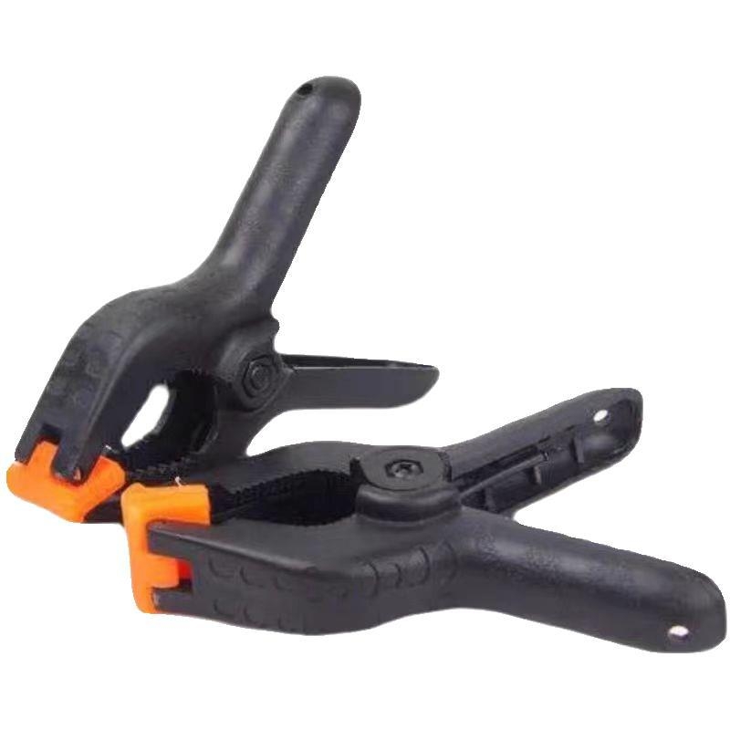 Fotografijos klipsas studijos fonui – PVC, universalus fonams ir difuziniam popieriui, 4 vnt., svoris 0,2 kg