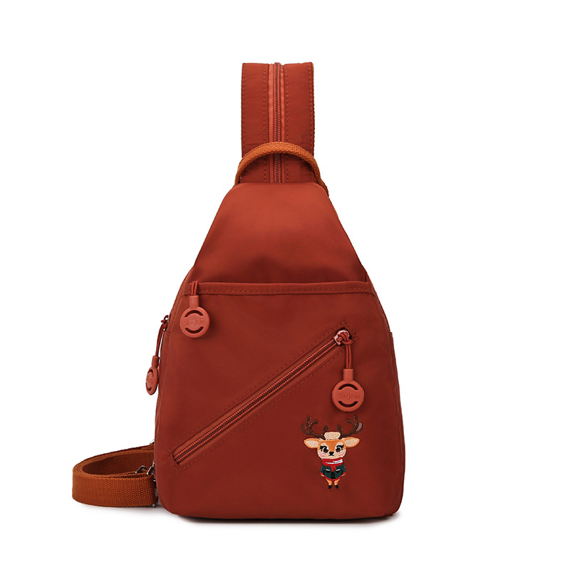 Crossbody torba, gradski stil, platnena materija, uspravni kvadratni oblik, zatvaranje na zip, skriveni džep sa zipom