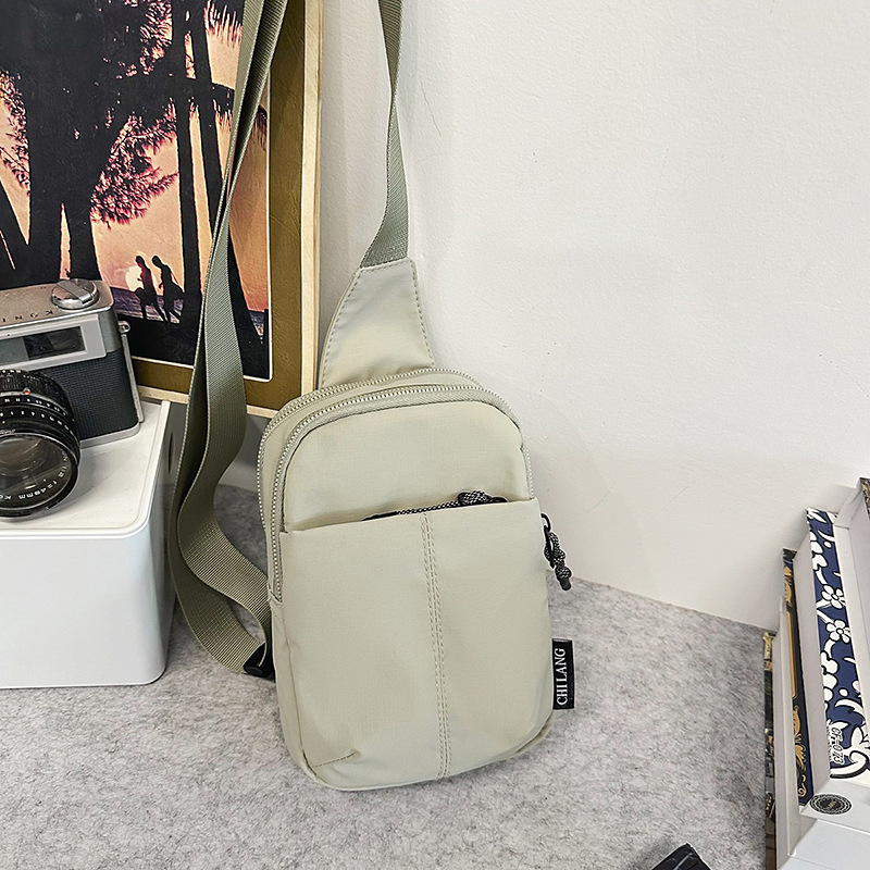 Crossbody torba, najlon materijal, zatvaranje zipom, džep za mobitel, marka KAMUANG