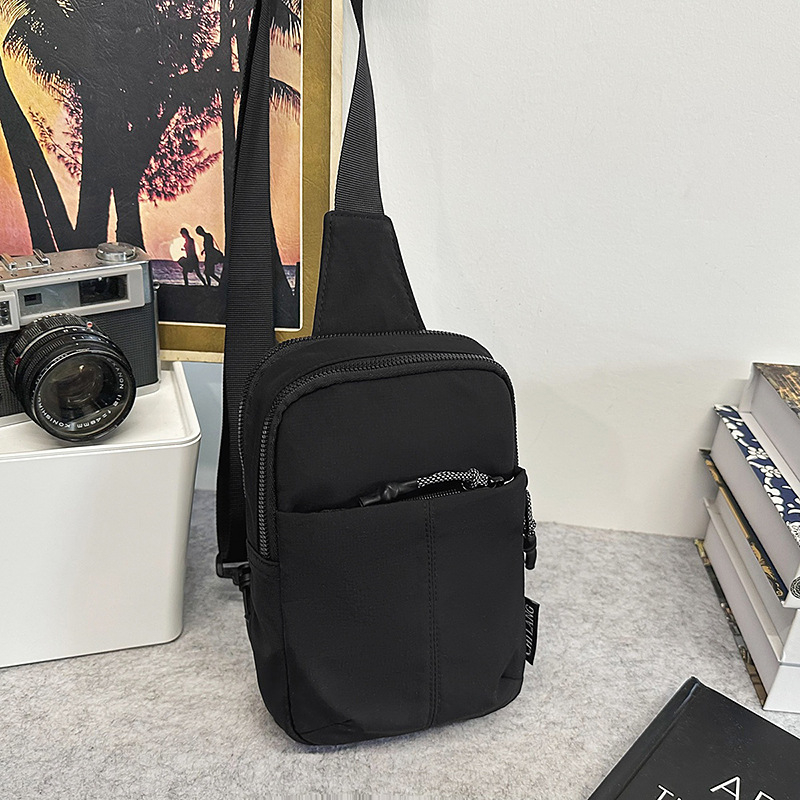 Crossbody torba, najlon materijal, zatvaranje zipom, džep za mobitel, marka KAMUANG