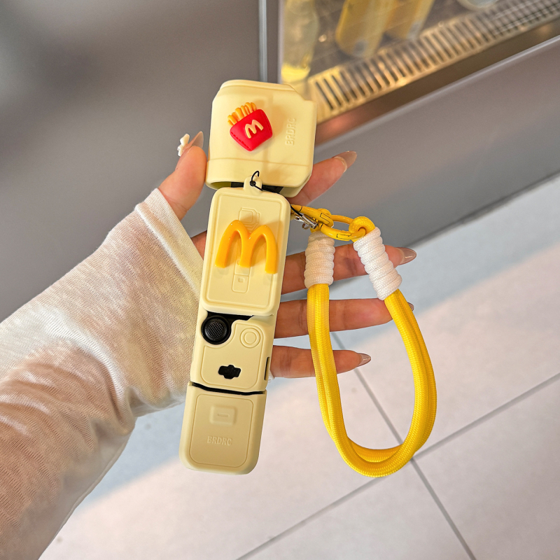 DJI Pocket 3 silikonska zaštitna maska s dizajnom pomfrija i ručnim remenom