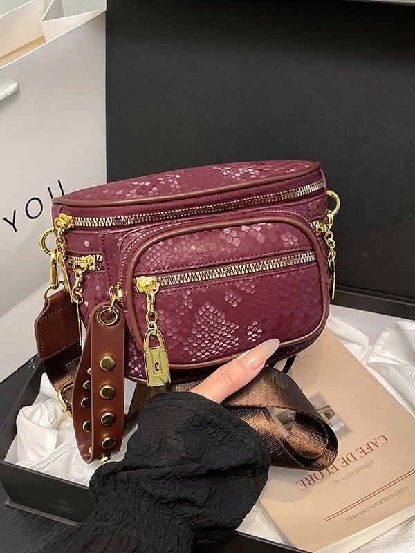 Crossbody torbica od PU, stil Saddle bag, oblik shell-type, zatvaranje na zip, laminirana unutarnja pretinac s zipom