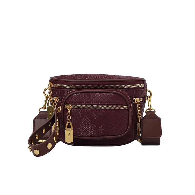 Crossbody torbica od PU, stil Saddle bag, oblik shell-type, zatvaranje na zip, laminirana unutarnja pretinac s zipom