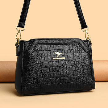 Ženska crossbody torbica — ugravirana vintage tekstura, PU materijal, zatvaranje na zip, horizontalni kvadratni oblik, široka naramenica