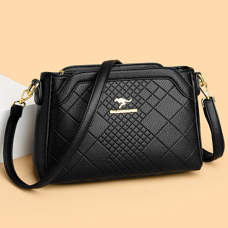 Ženska crossbody torbica — ugravirana vintage tekstura, PU materijal, zatvaranje na zip, horizontalni kvadratni oblik, široka naramenica