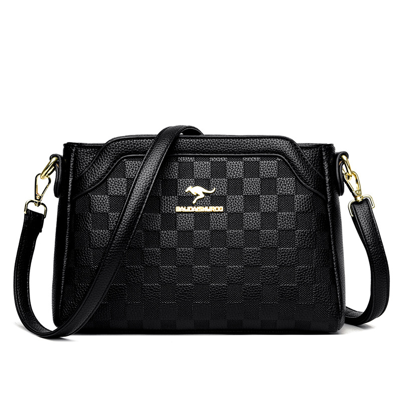 Ženska crossbody torbica — ugravirana vintage tekstura, PU materijal, zatvaranje na zip, horizontalni kvadratni oblik, široka naramenica