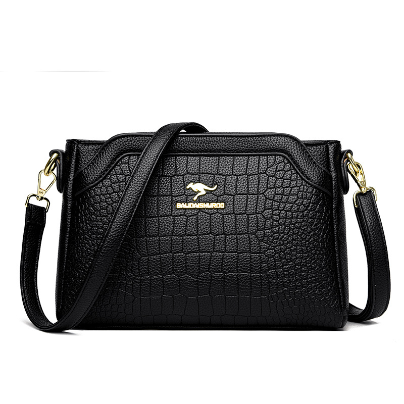 Ženska crossbody torbica — ugravirana vintage tekstura, PU materijal, zatvaranje na zip, horizontalni kvadratni oblik, široka naramenica
