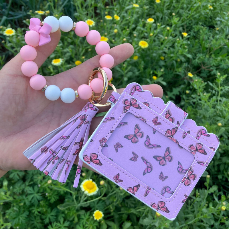 Carcasă pentru carduri din PU cu curea la încheietură și pandantiv cu fluture – monedă-porofel, breloc (PU • stil proaspăt și dulce • utilizare zilnică)
