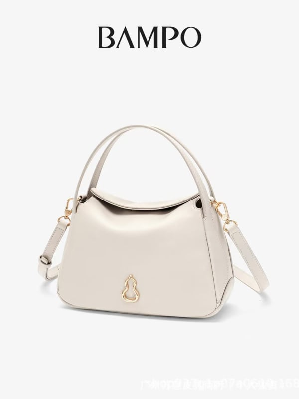 Bampo Geantă tip găleată din piele naturală, unisex, curea simplă, închidere magnetică, buzunar interior cu fermoar laminat și căptușeală poliester