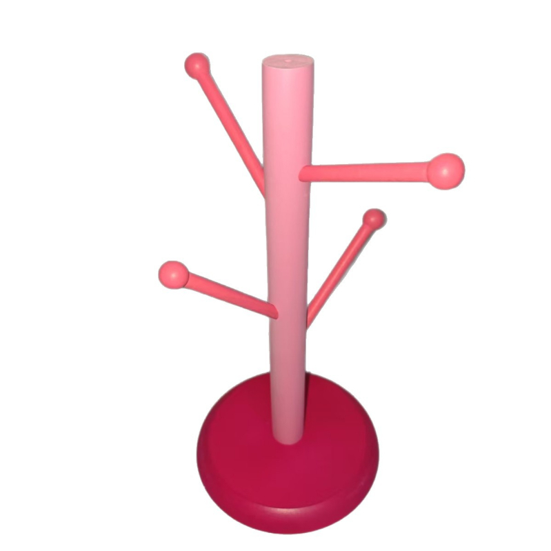 Slatki drveni ružičasti organizator za stol s nepravilnim privjeskom i figuricom za slušalice, četiri razine