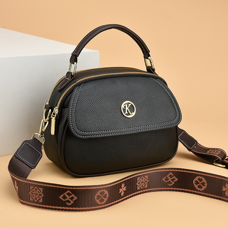 Minimalistička ženska crossbody torba, novi model niche stila, inspirirana korejskim stilom, PU torba preko ramena, mala i elegantna za svakodnevnu upotrebu.