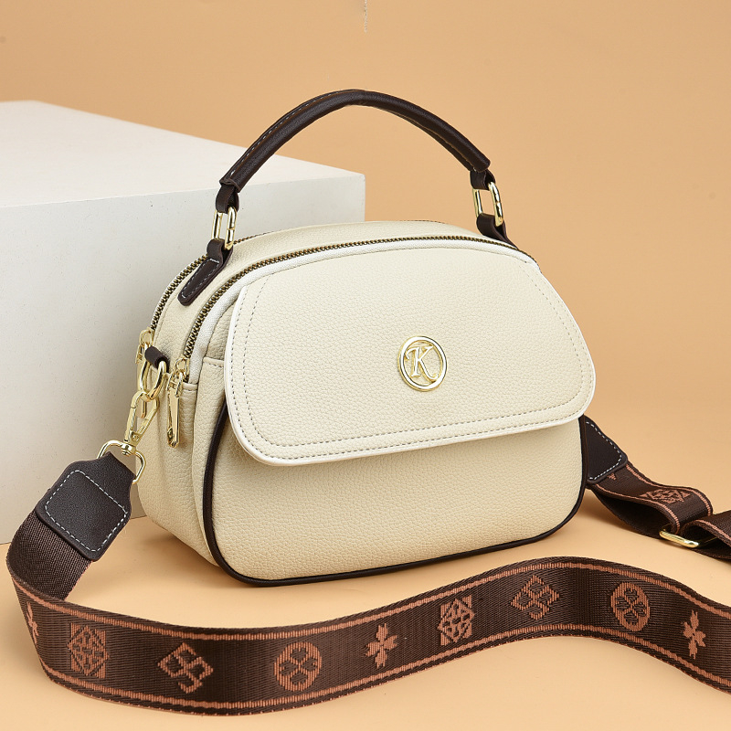 Minimalistička ženska crossbody torba, novi model niche stila, inspirirana korejskim stilom, PU torba preko ramena, mala i elegantna za svakodnevnu upotrebu.