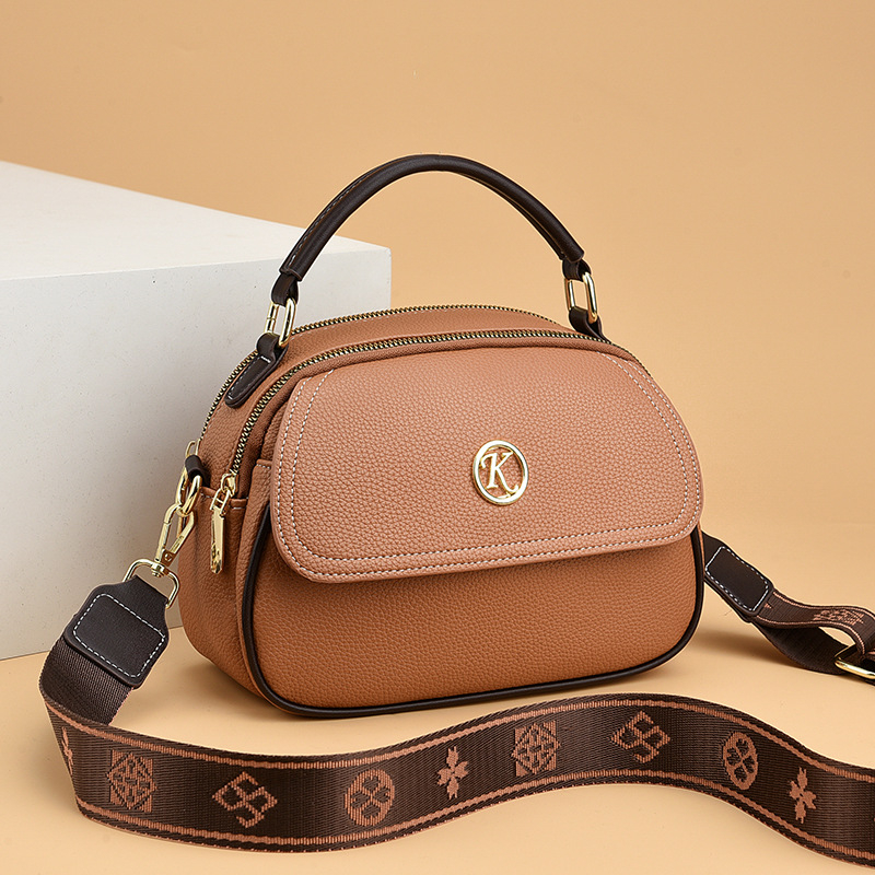 Minimalistička ženska crossbody torba, novi model niche stila, inspirirana korejskim stilom, PU torba preko ramena, mala i elegantna za svakodnevnu upotrebu.