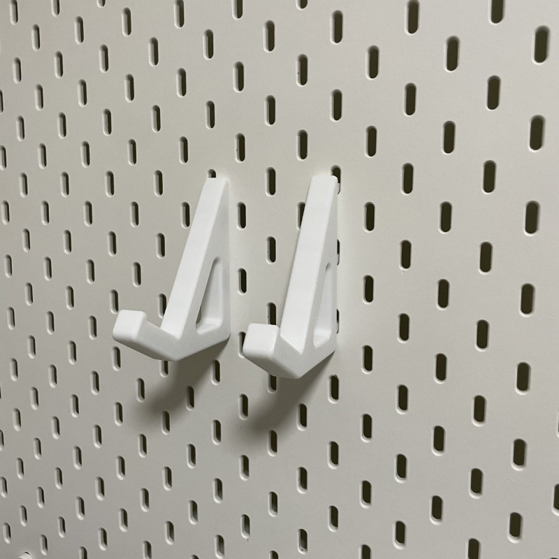 Skadis universālais mehāniskais tastatūras turētājs perforētajam panelim